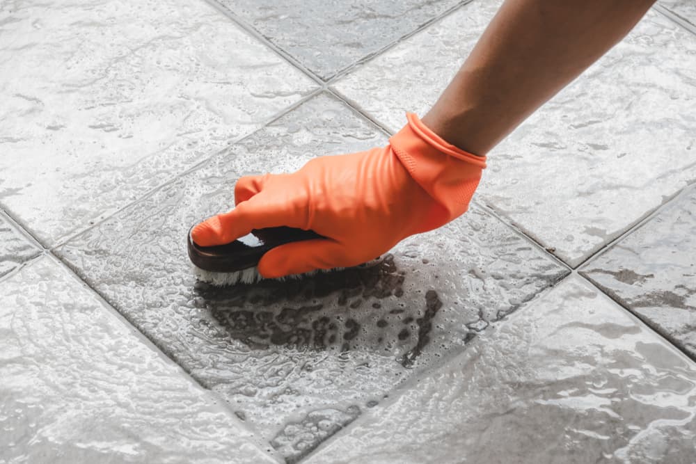 How do tile cleaning services price their work?